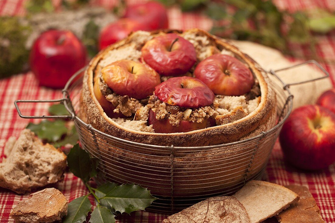 Baked apples in loaf of bread