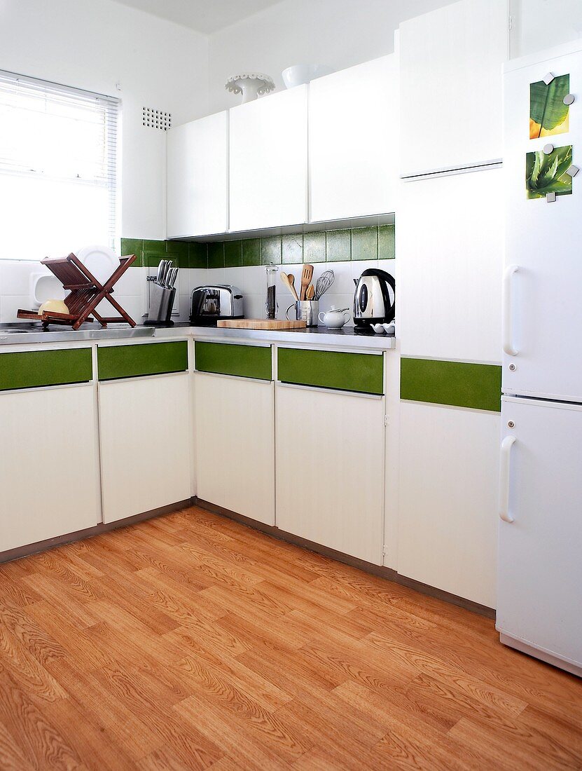 White kitchen with a green stripe