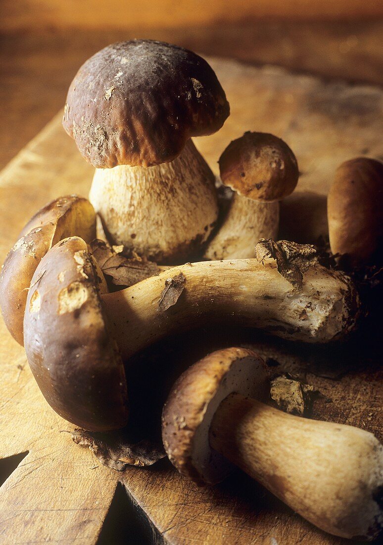 Ceps on wooden board