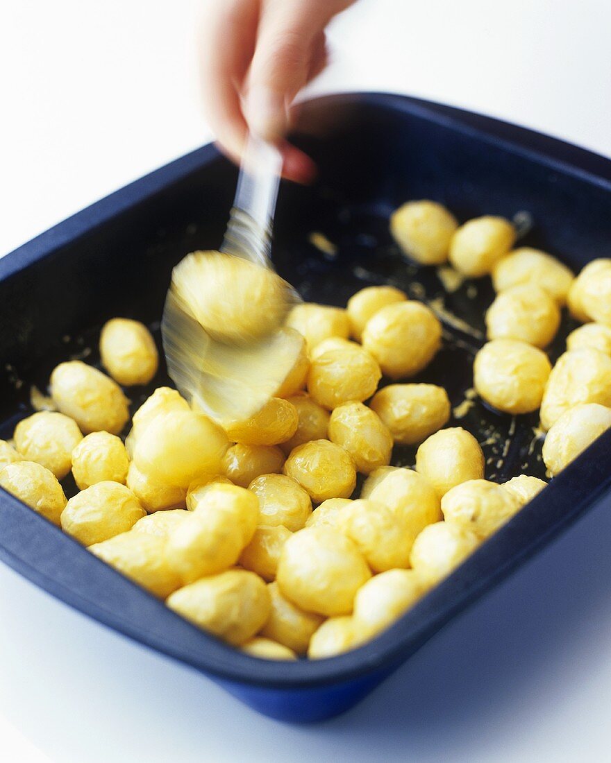 Roast potatoes in a roasting tin