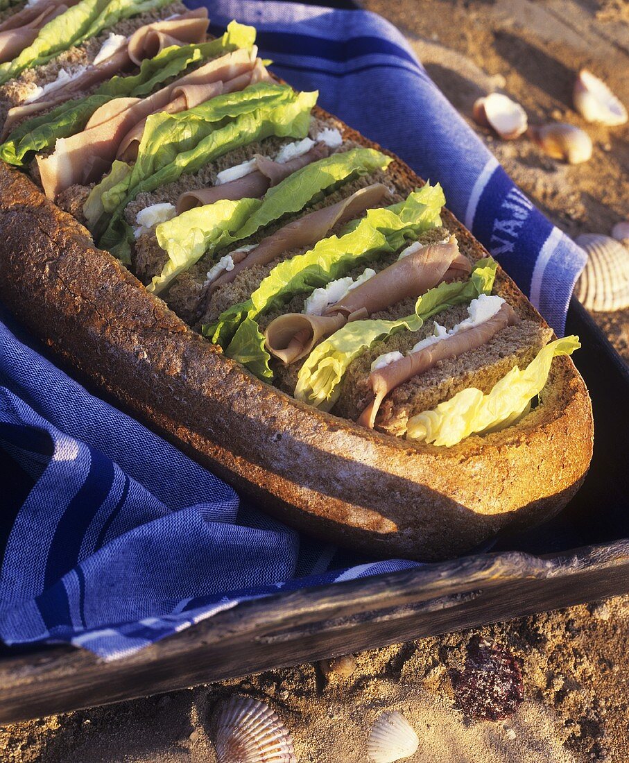 Sandwiches in hollowed-out loaf