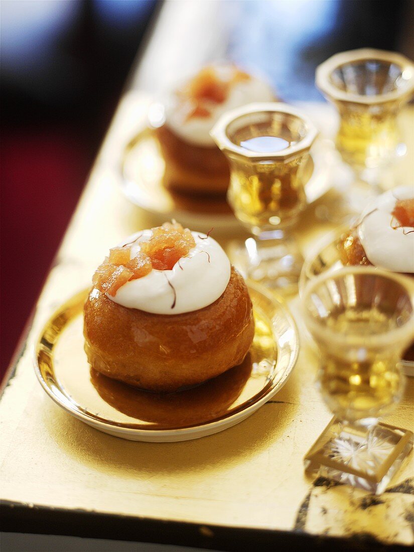 Savarin with cream and candied fruit