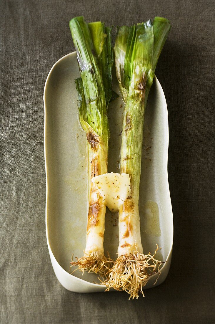 Roasted leeks with butter and nutmeg