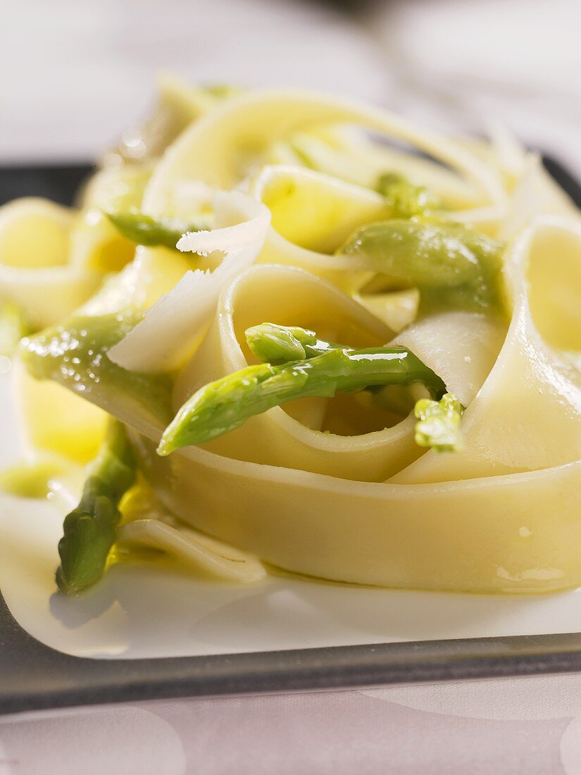 Ribbon pasta with green asparagus and Parmesan