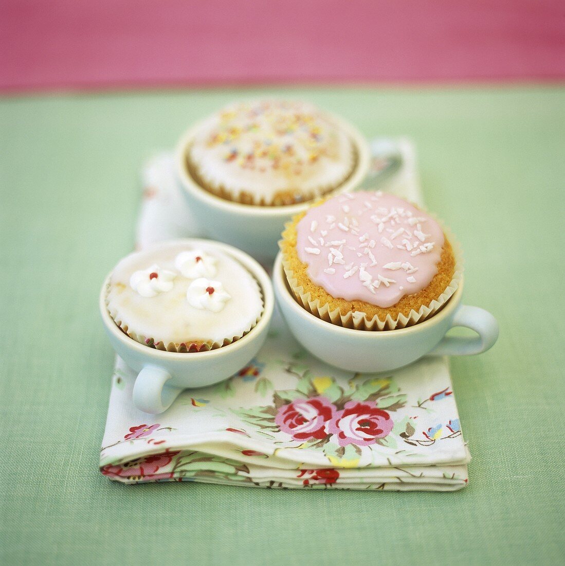 Decorated cup-cakes in cups