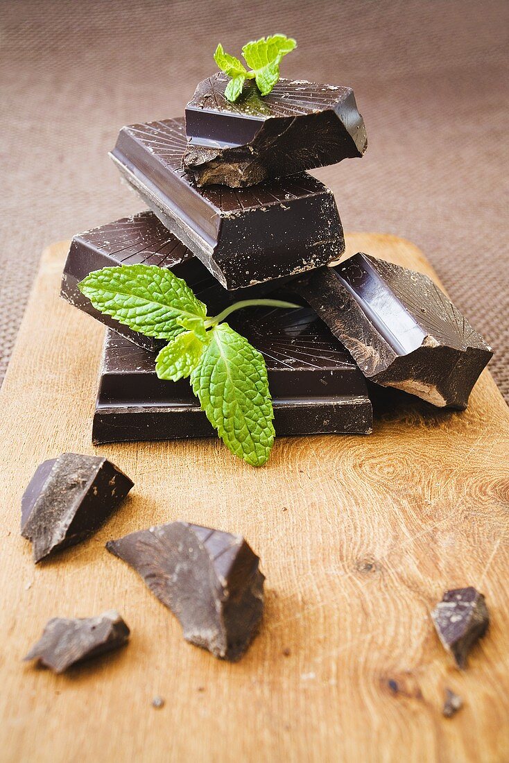 Pieces of chocolate with mint leaves