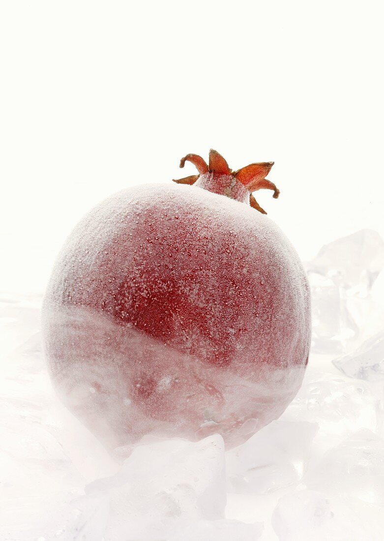Frozen pomegranate (close-up)