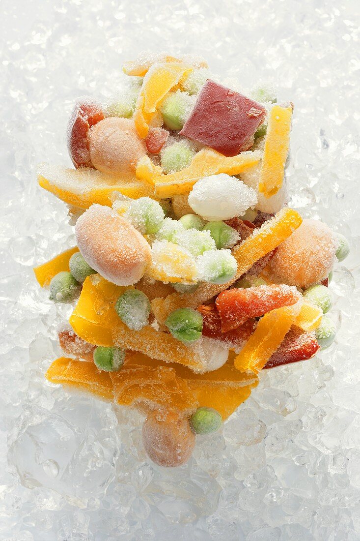 Frozen mixed vegetables on ice
