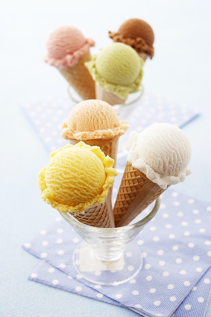 Ice cream cones with different flavours of ice cream