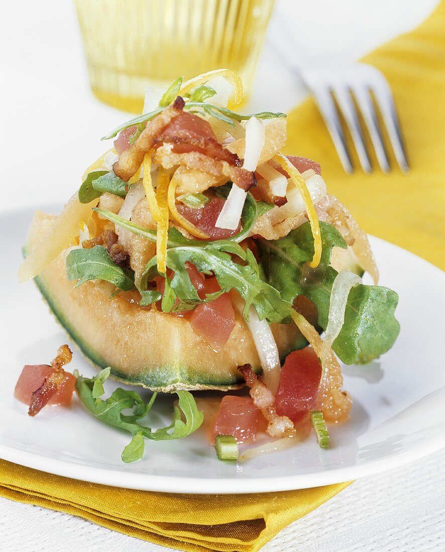 Melon with tuna, rocket and bacon