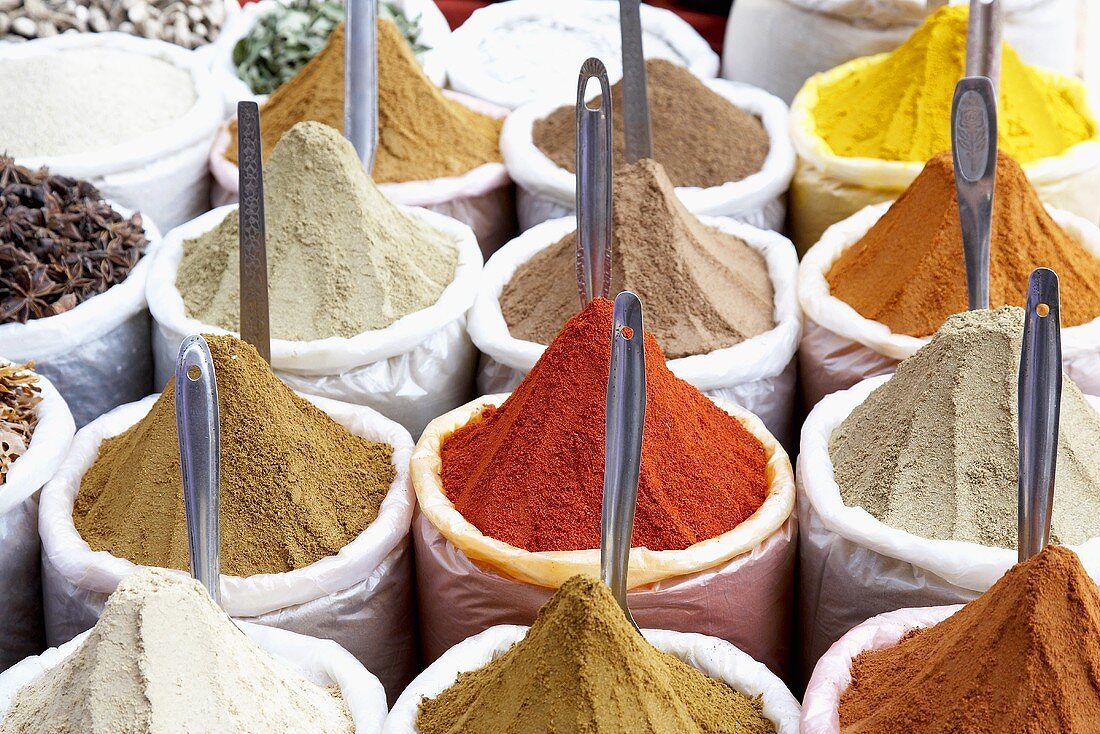 Various spices in sacks at a market