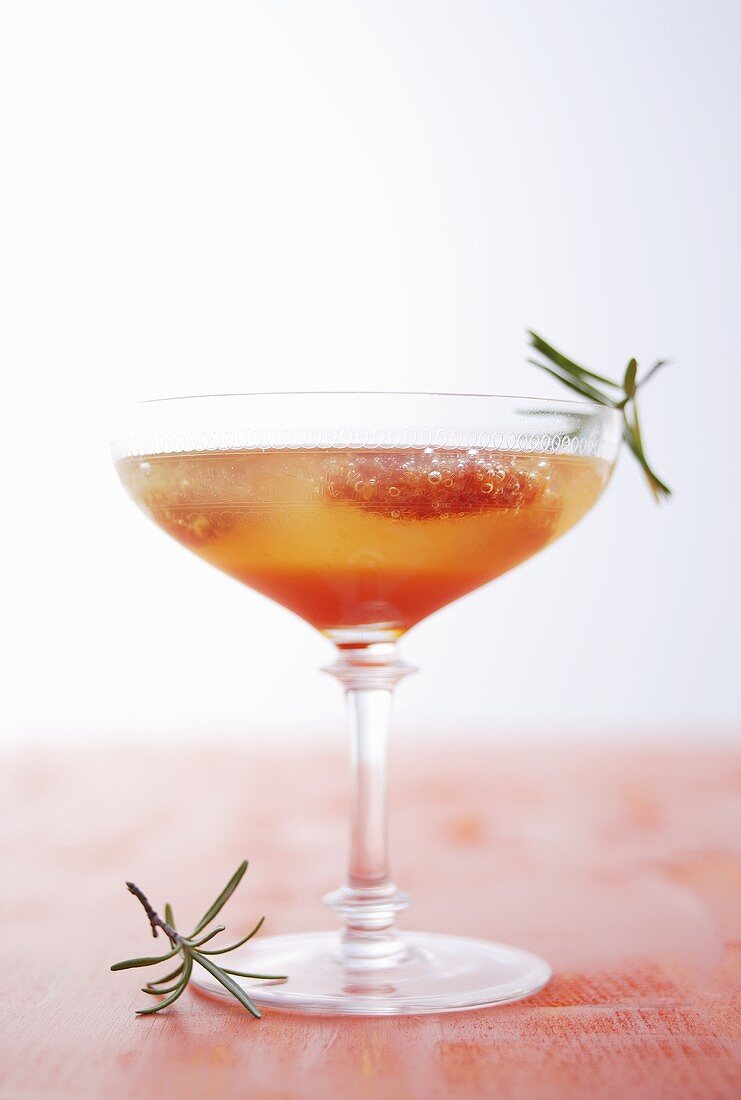 Blood orange drink with rosemary
