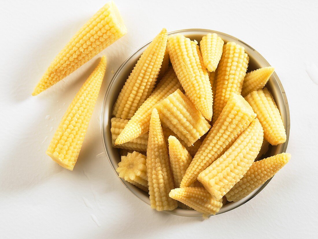 Baby corn in tin (overhead view)