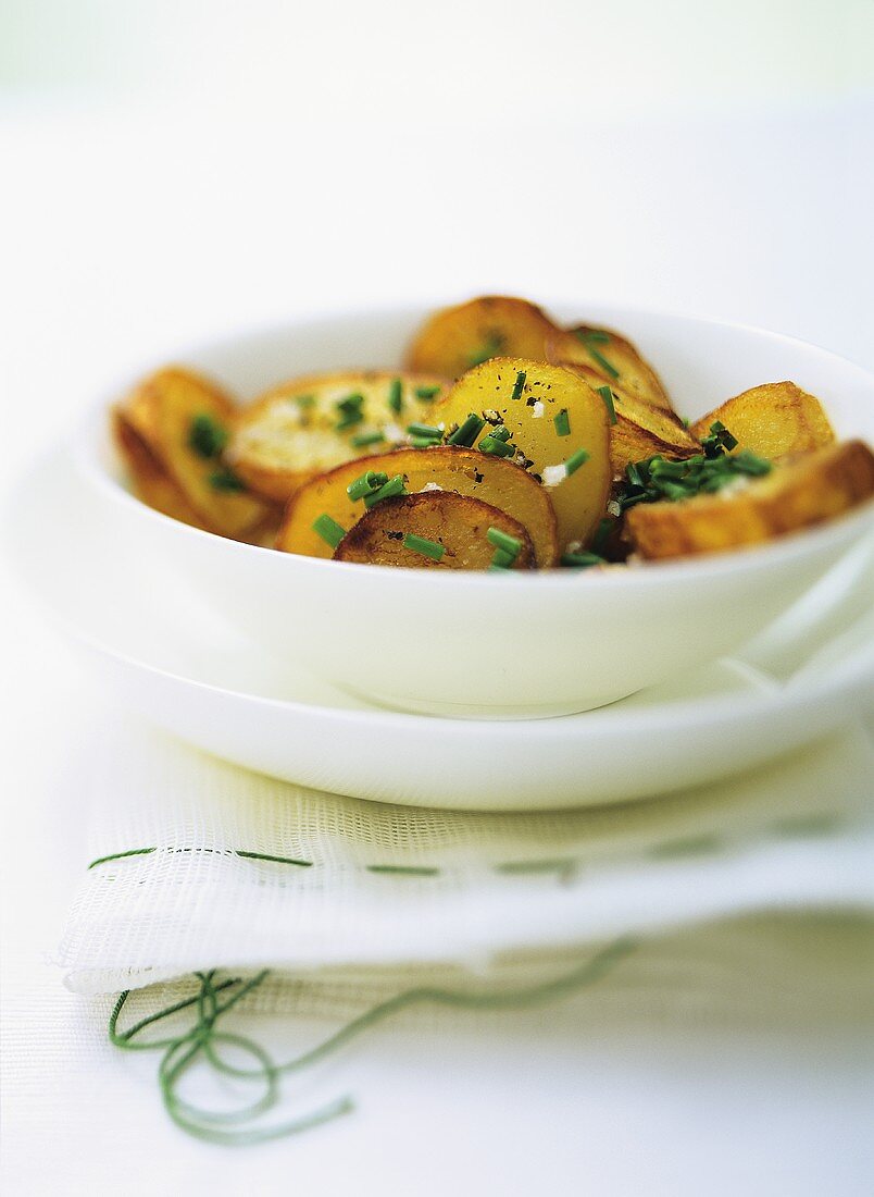 Fried potatoes with chives