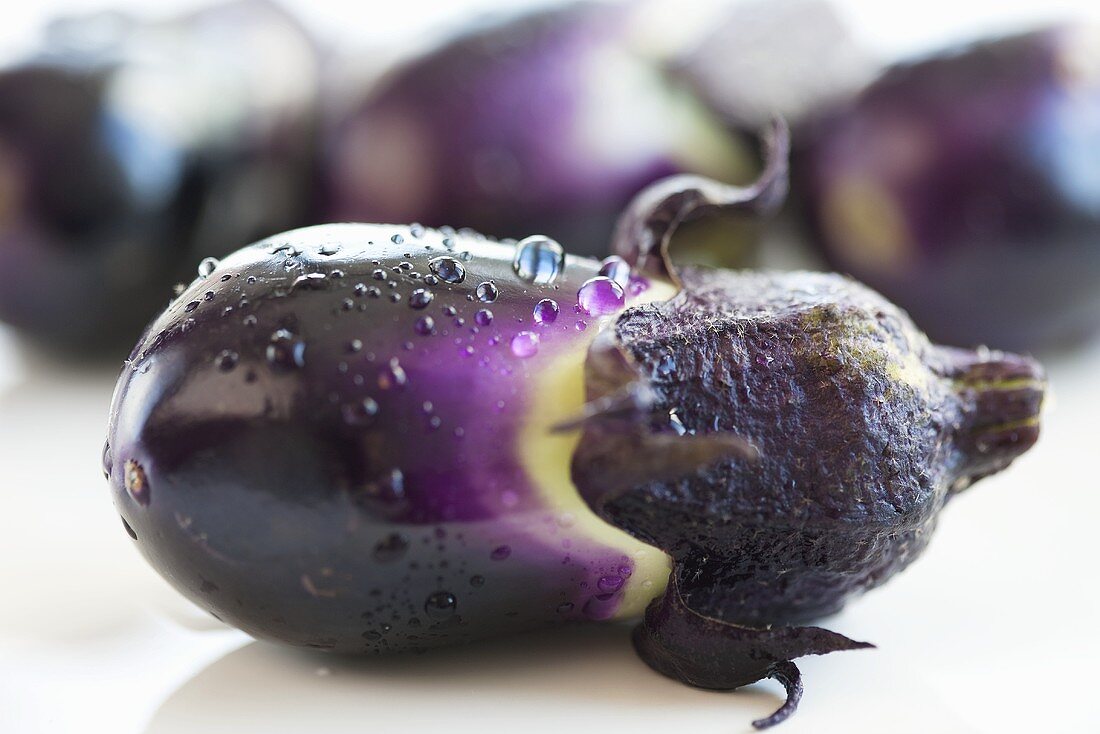 Aubergine with drops of water (close-up)