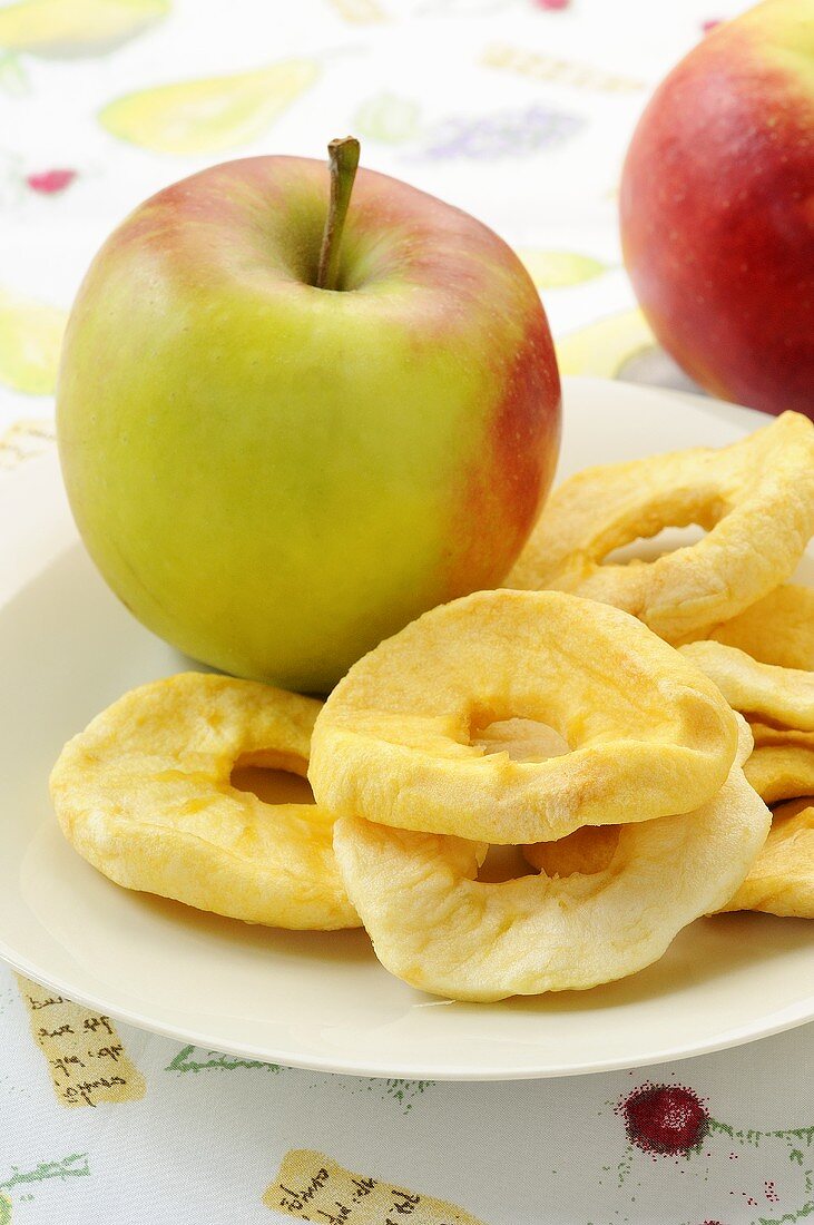 Dried apple rings and fresh apples
