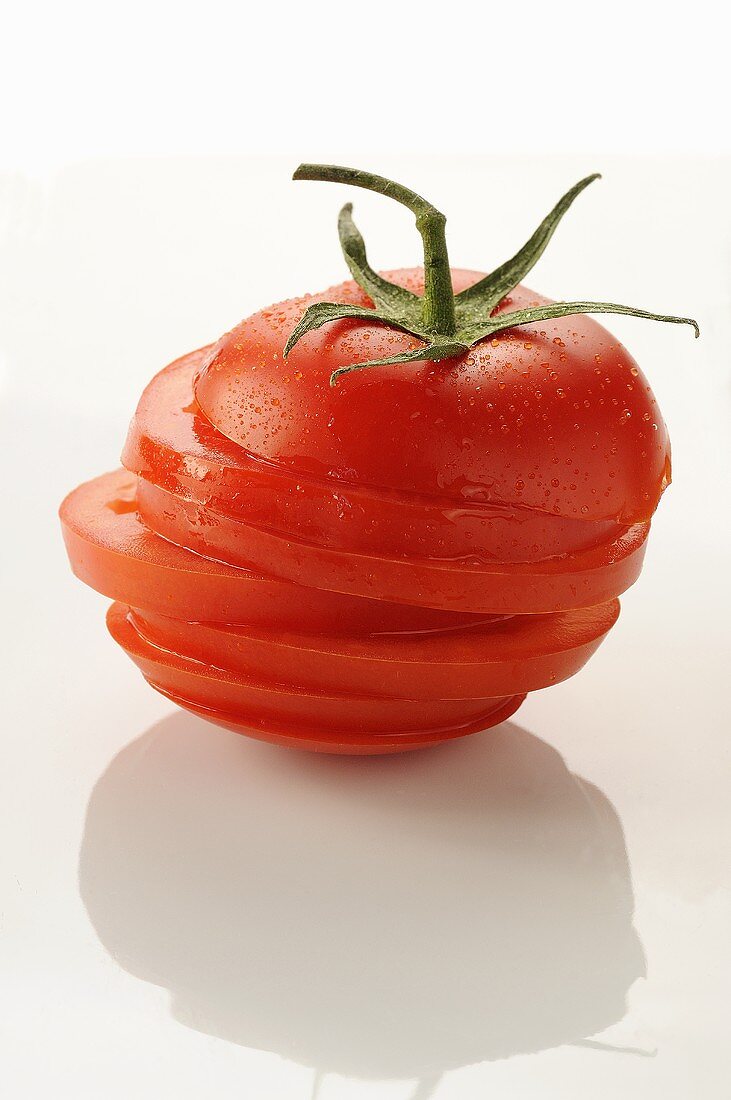 Tomate, in Scheiben geschnitten