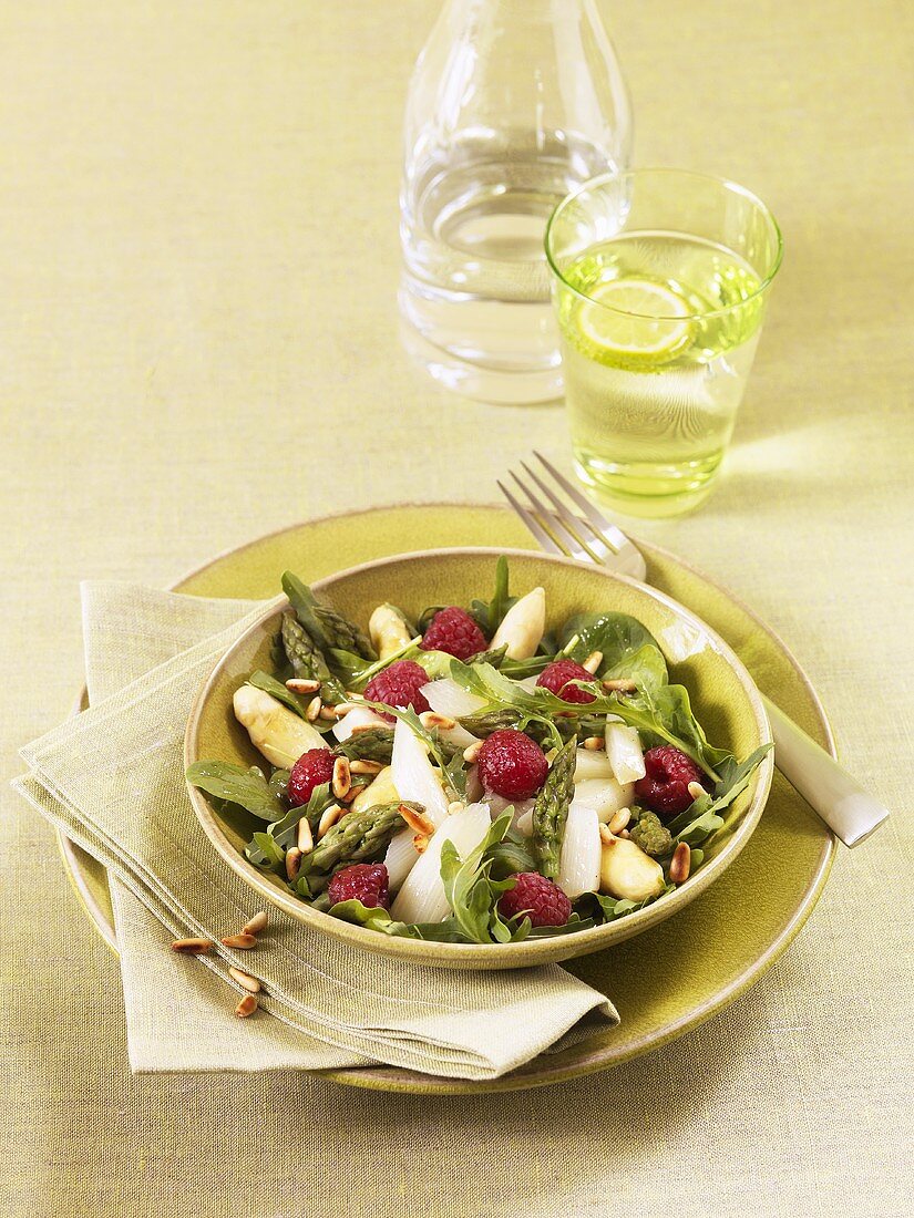 Asparagus and raspberry salad with spinach and rocket