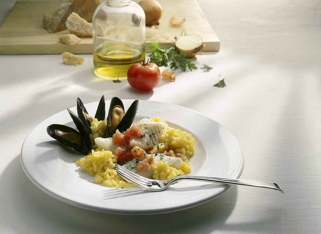 Saffron risotto with mussels and halibut