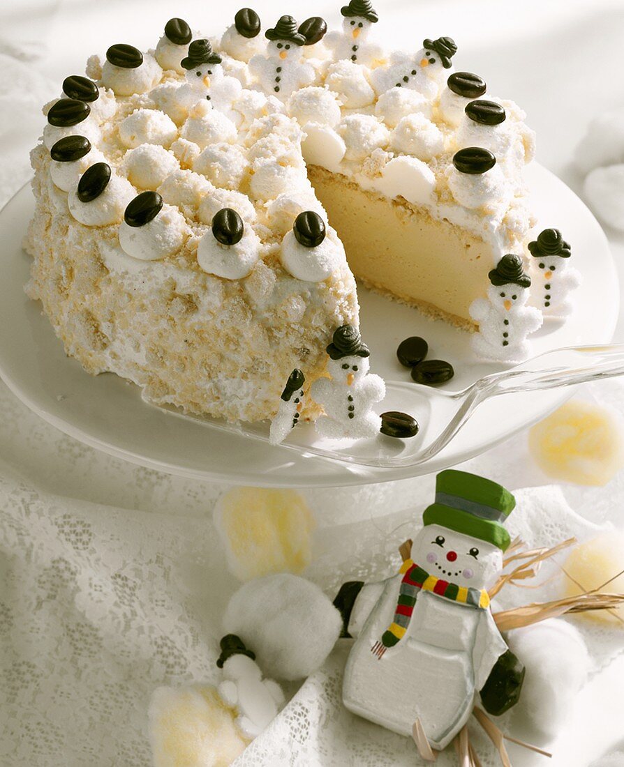 Snow cake with snowman decorations