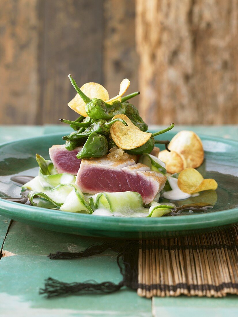 Seared tuna fillets on cucumber salad