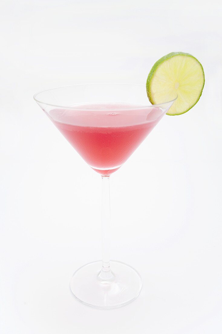 A Cosmopolitan cocktail with slice of lime