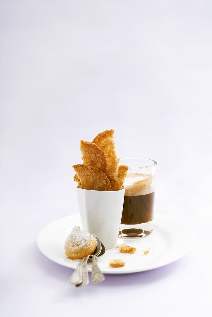 Espresso in glass and biscuits
