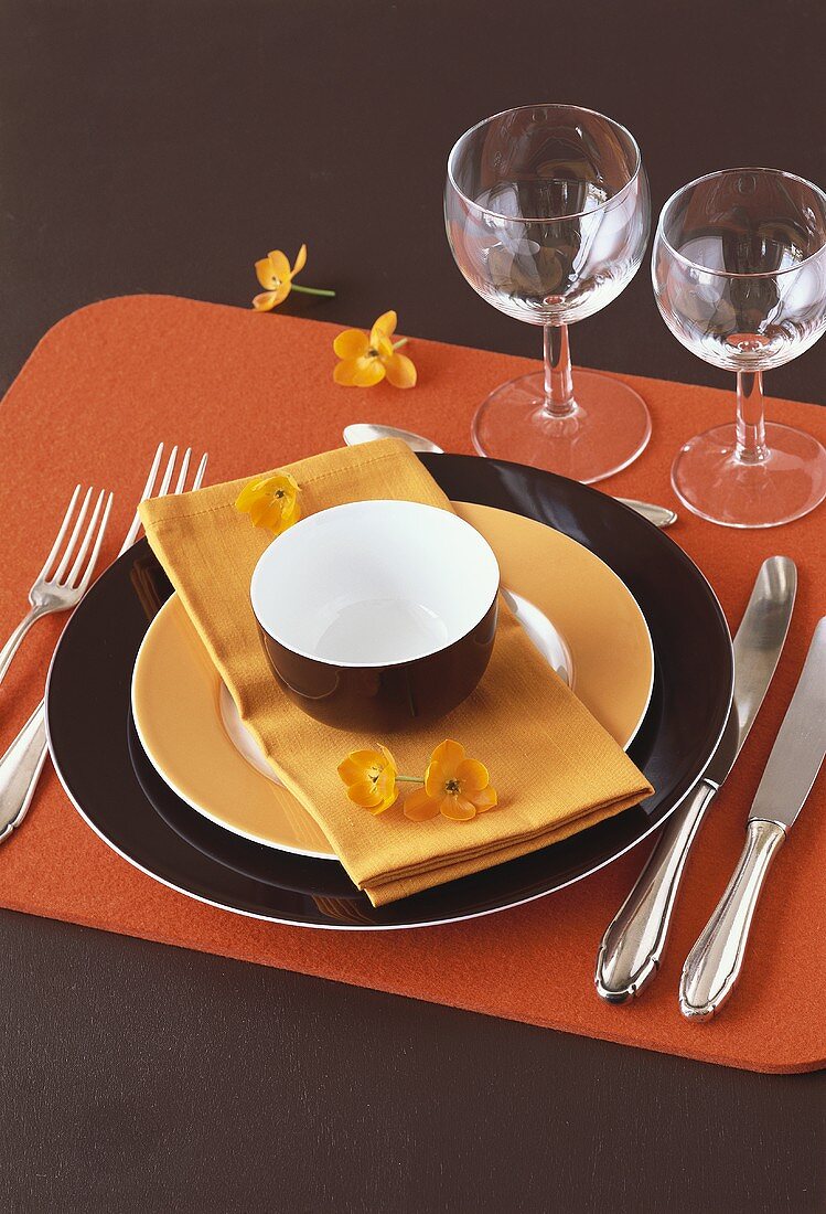Place-setting with wine glasses