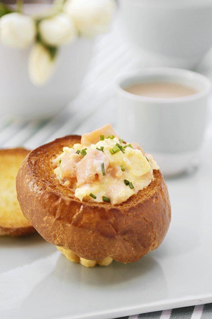 Brioche with scrambled egg and smoked salmon