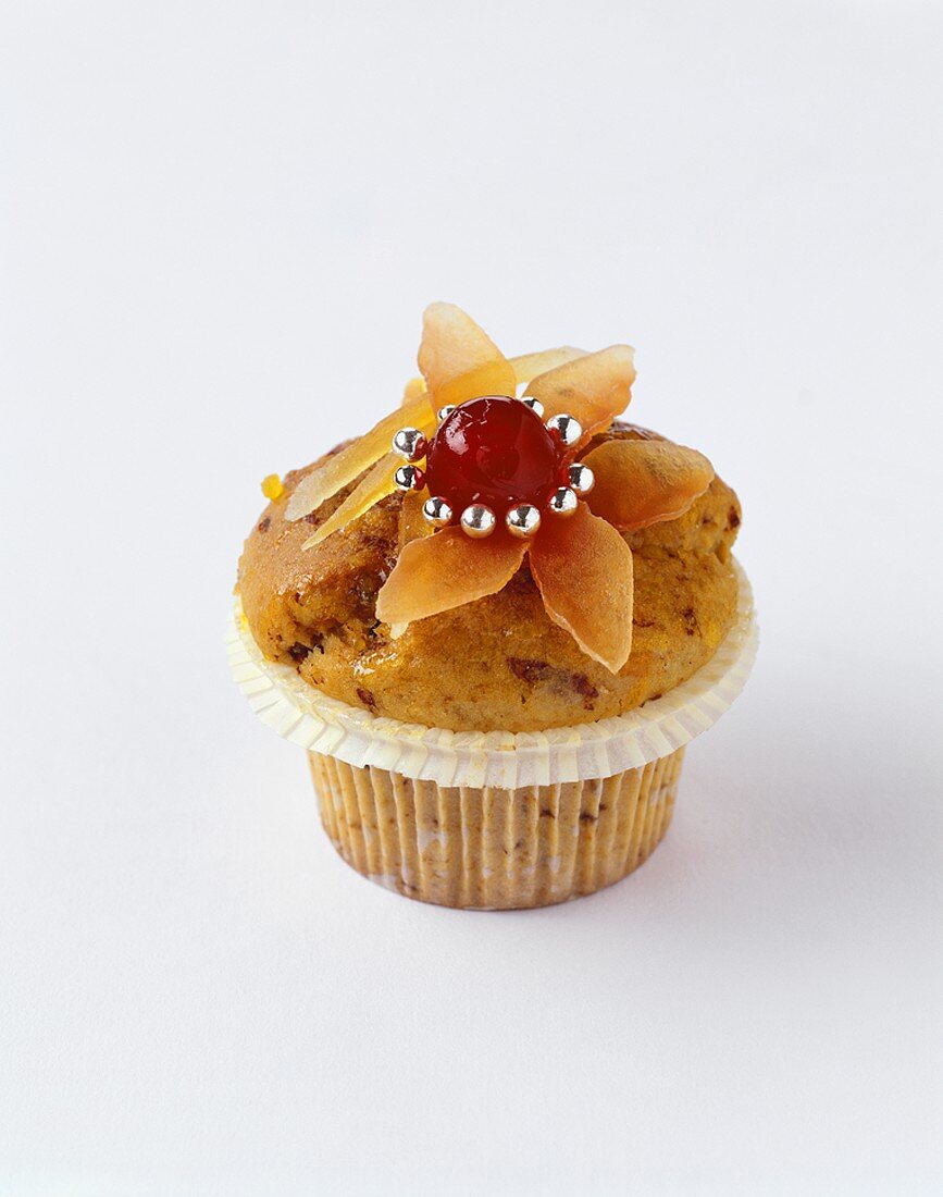 Gingerbread muffin decorated with silver dragées & glacé cherry