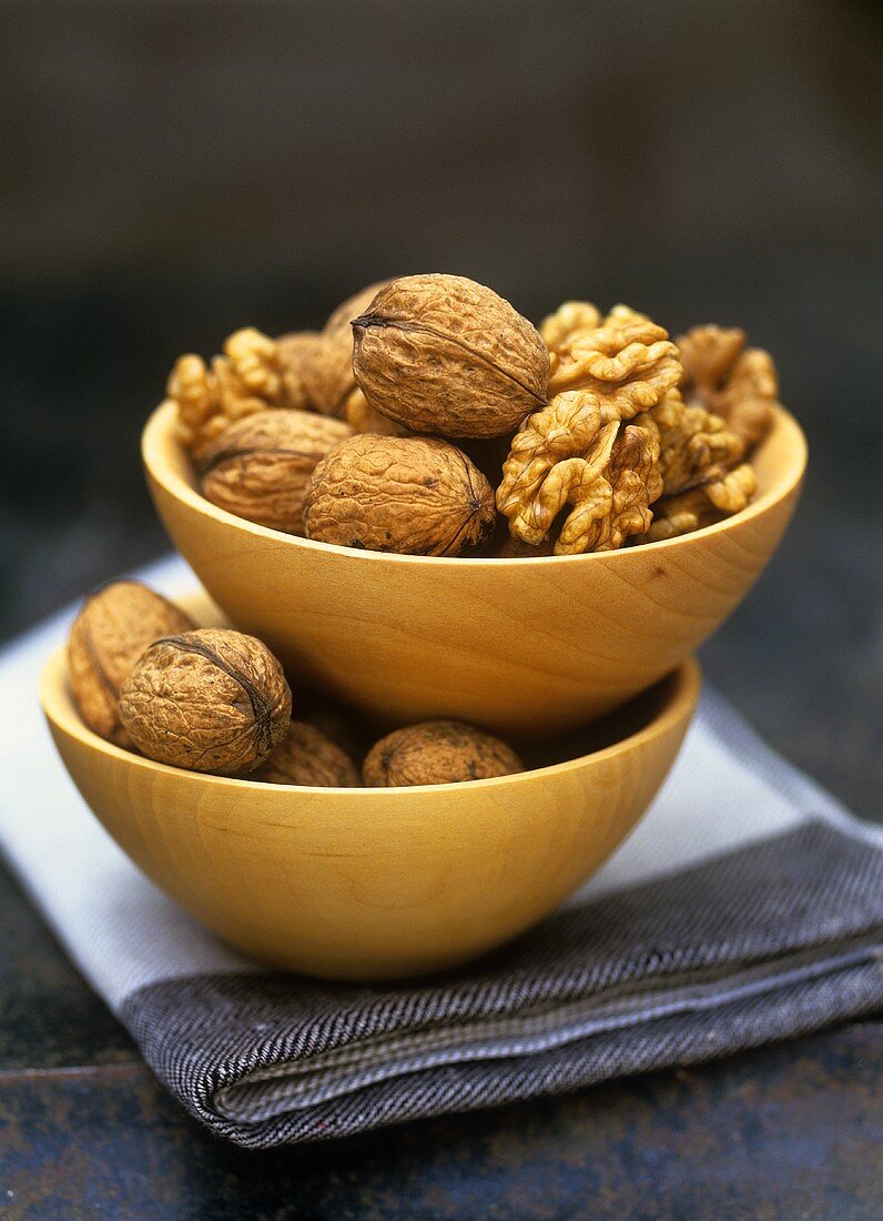 Walnuts in wooden bowls