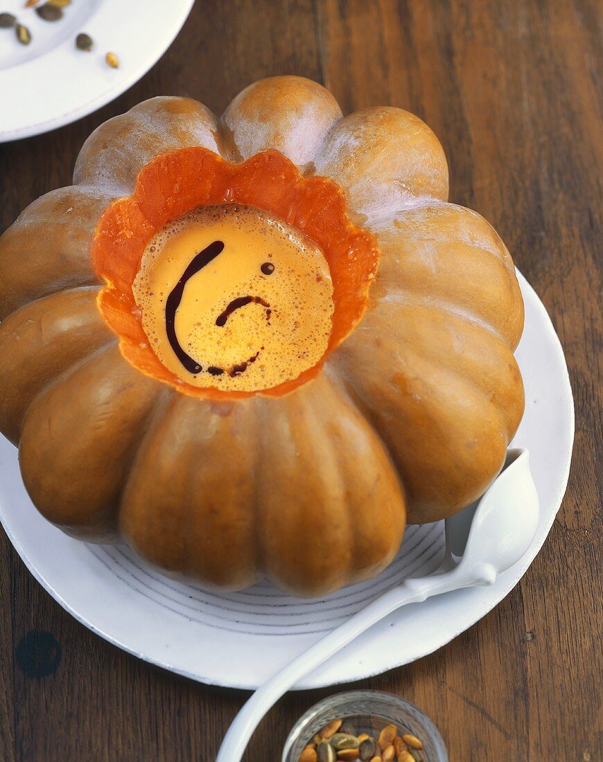 Pumpkin soup in hollowed-out pumpkin