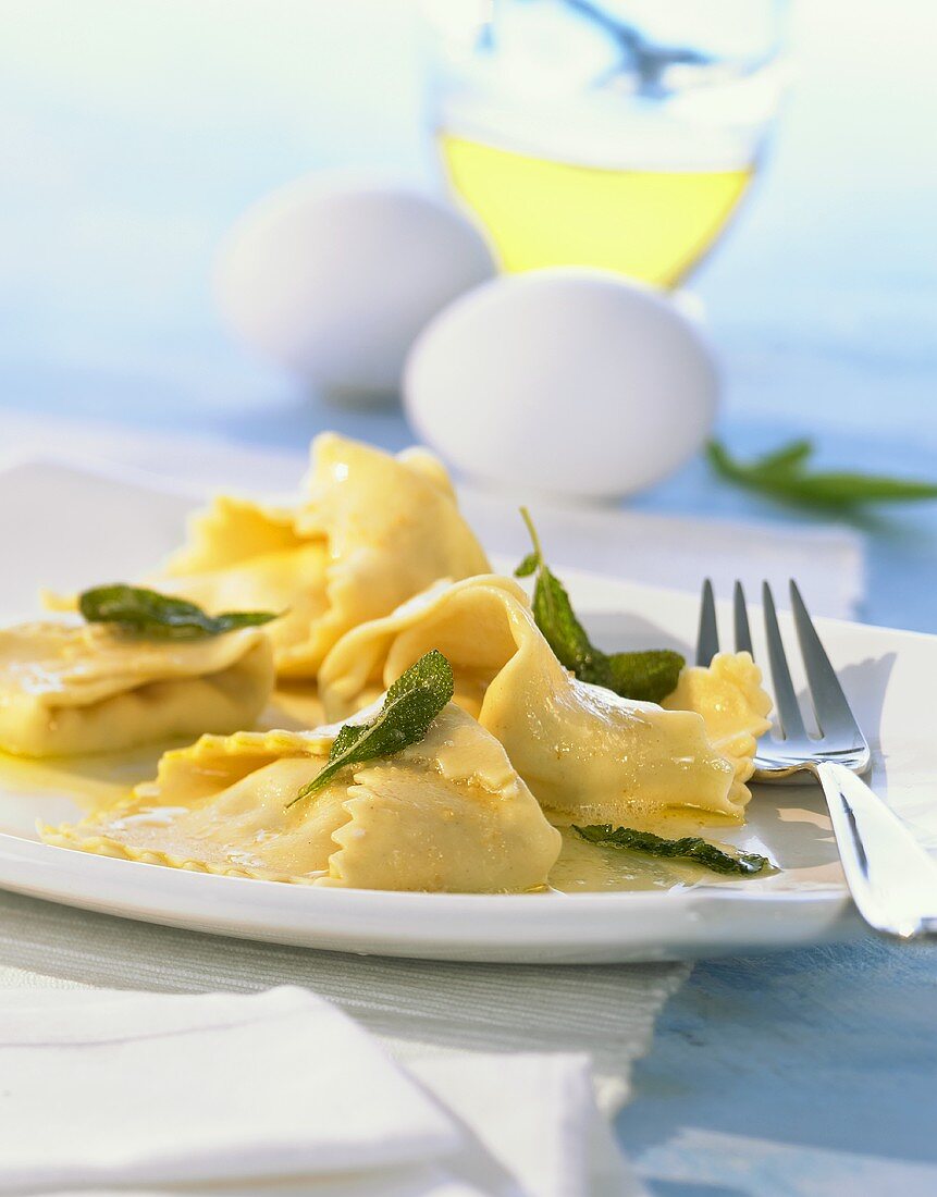 Home-made tortelloni with butter and sage