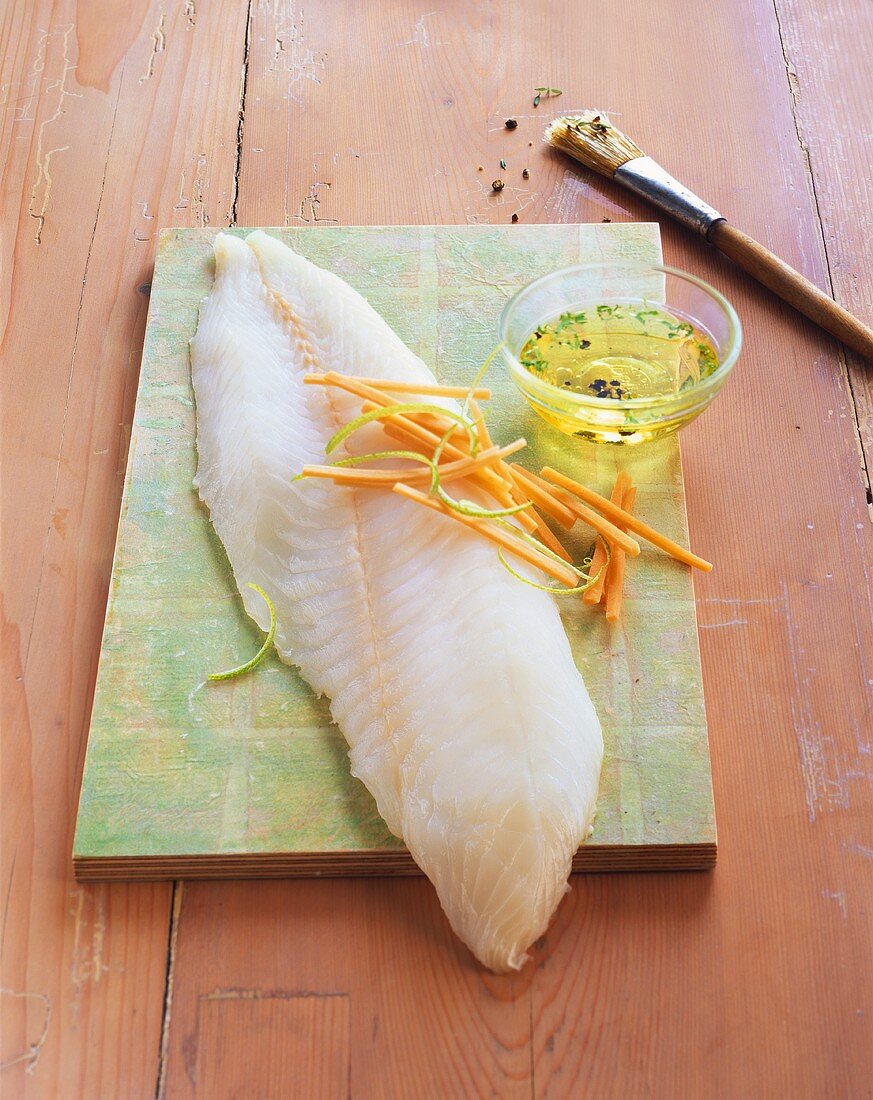 Hake fillet with julienne vegetables and marinade