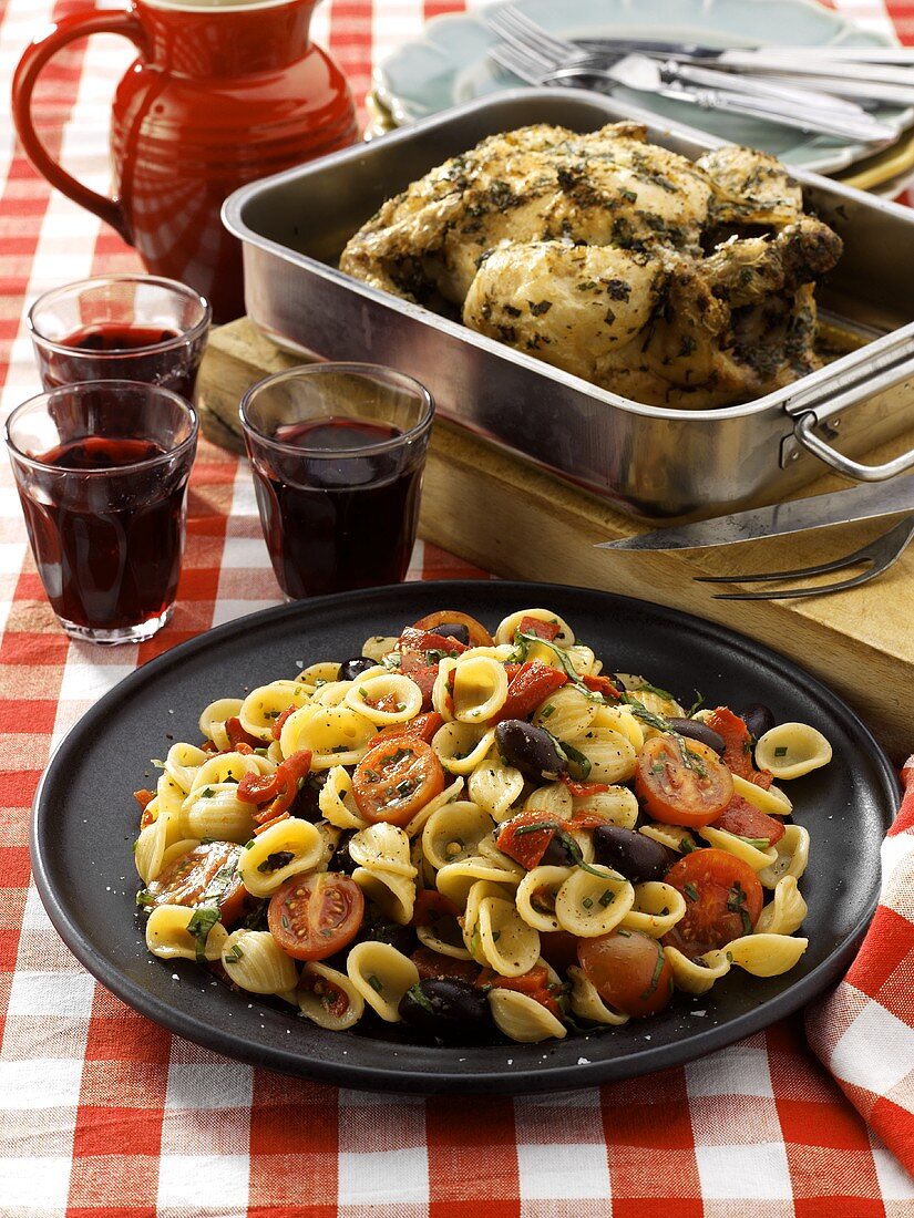 Orecchiette with cocktail tomatoes, chicken in roasting tin