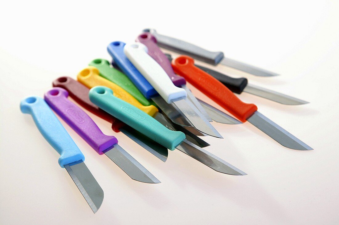 Kitchen knives with different coloured handles