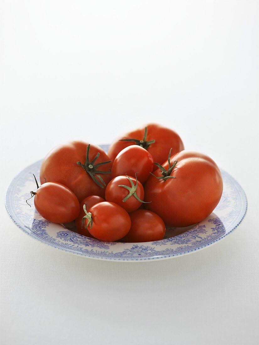 Various types of tomatoes on plate