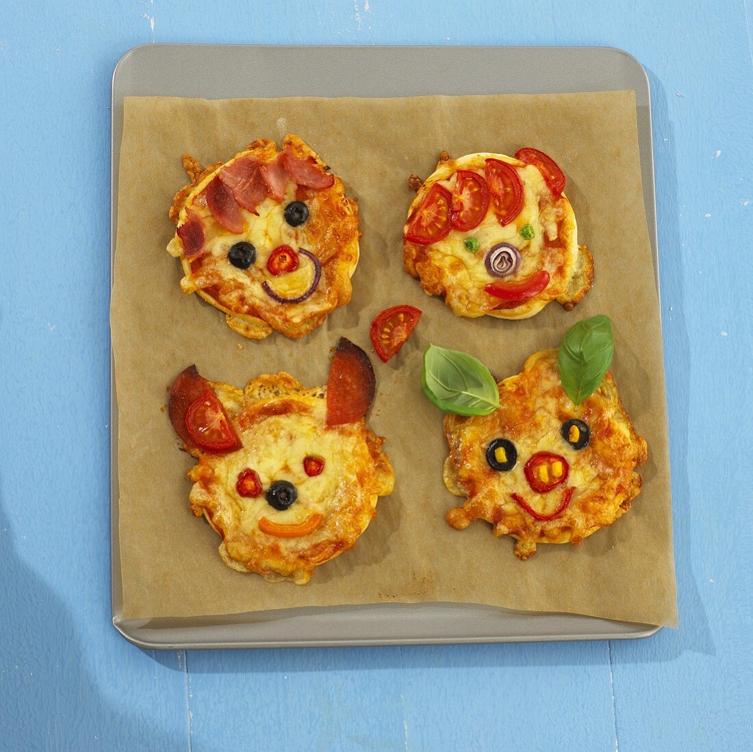 Minipizzen mit Tiergesichtern