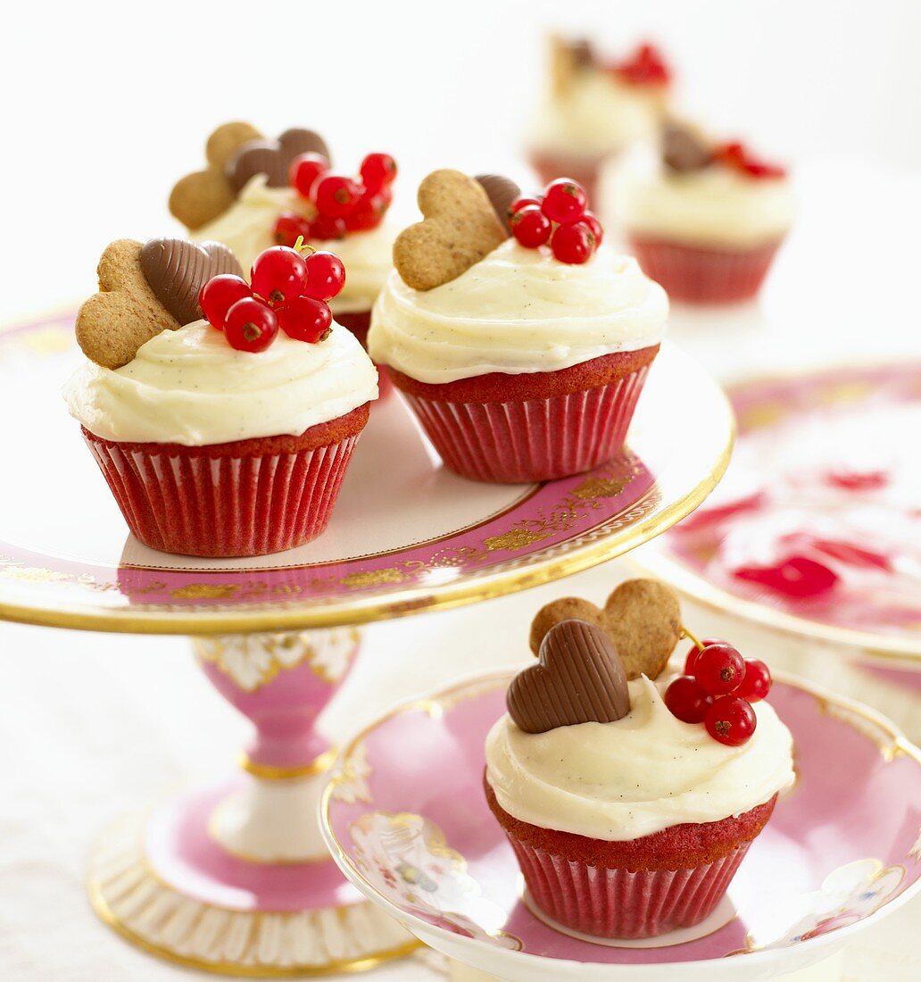 Red velvet cupcakes with redcurrants