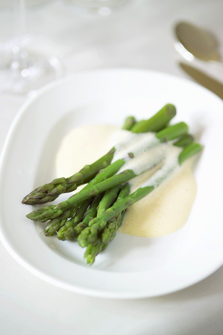 Green asparagus with butter sauce