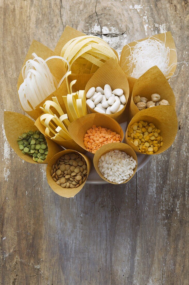 Noodles, pulses and rice in paper bags