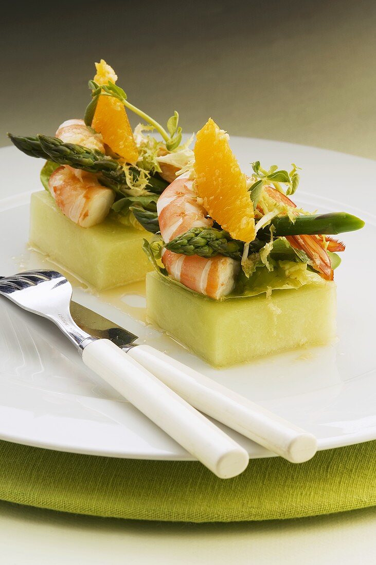 Prawn and asparagus salad on squares of melon