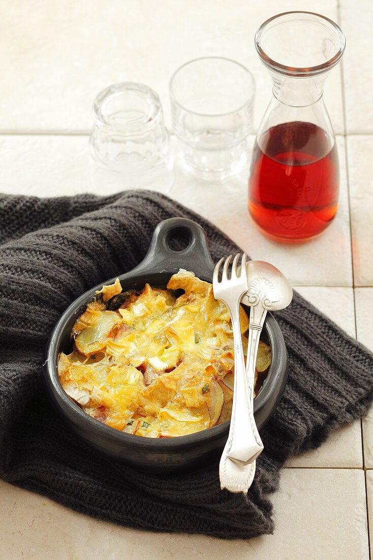 Tartiflette (potato and bacon dish, Savoy) with Camembert