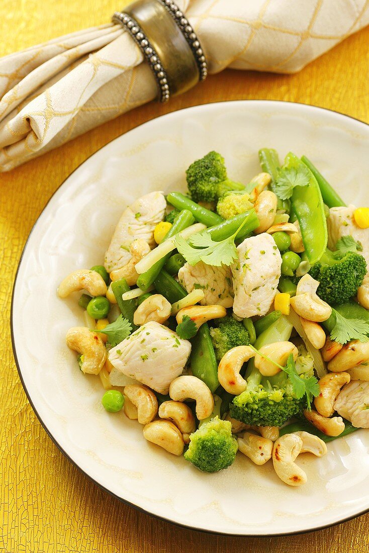 Chicken with vegetables, cashew nuts and fresh coriander