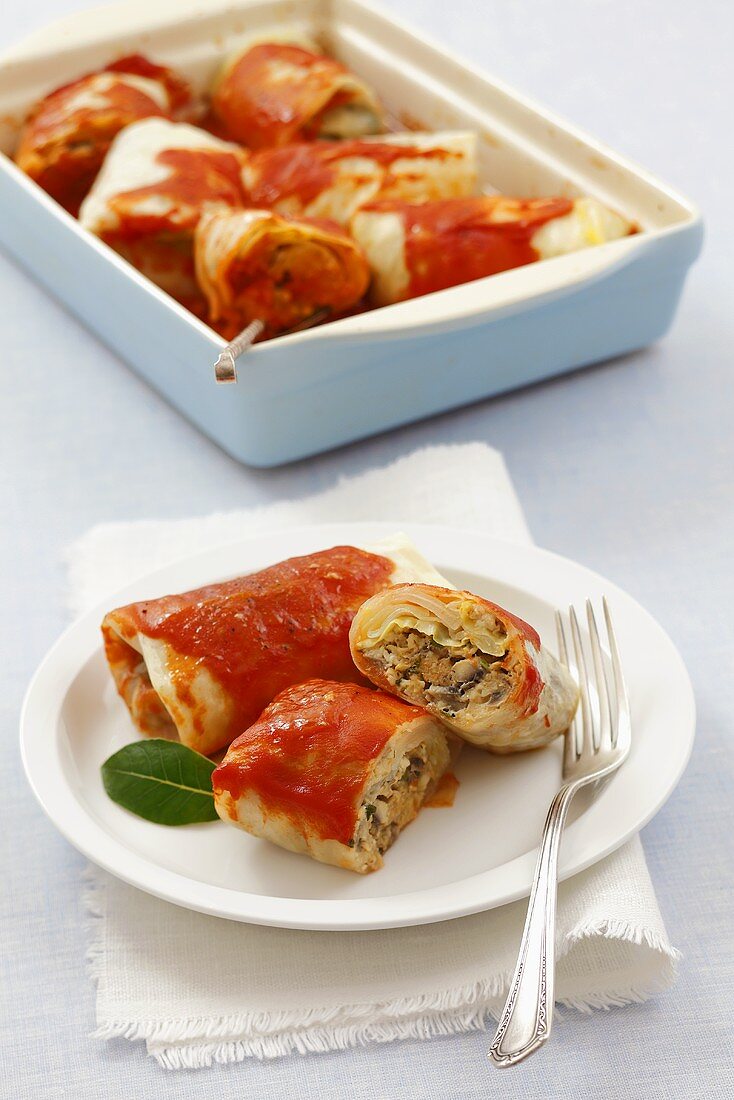 Cabbage leaves stuffed with mushrooms, tomato sauce