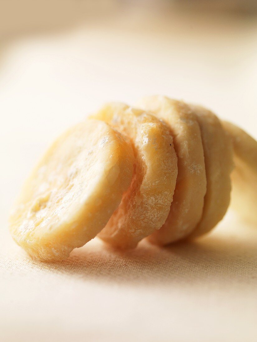 Slices of round goat's cheese