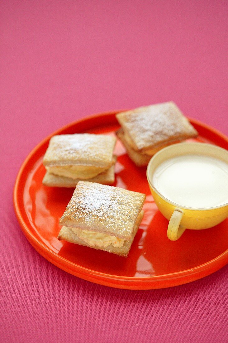 Vanilla slices and cup of milk