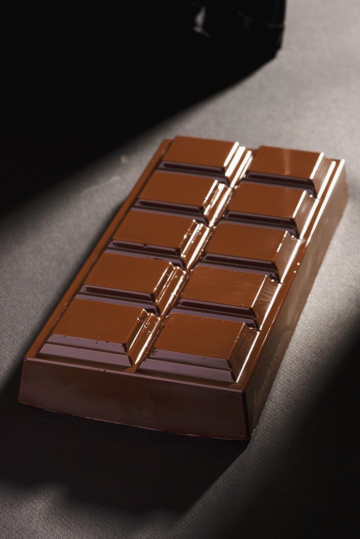 A bar of dark chocolate