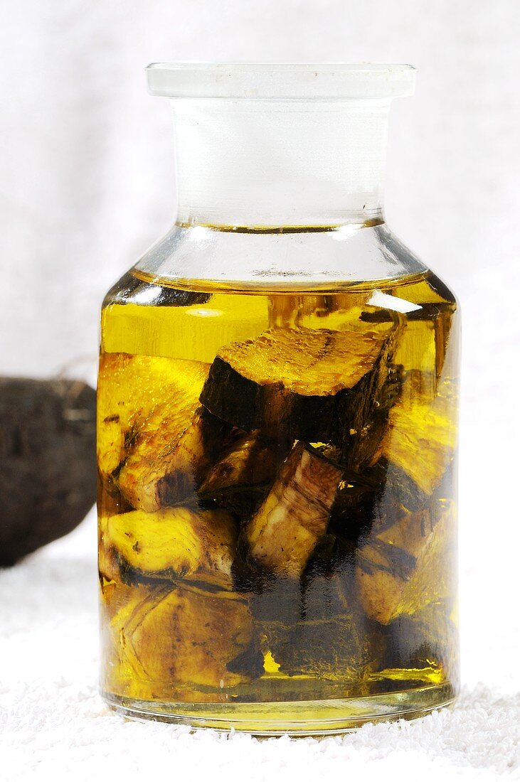 Comfrey oil in apothecary jar
