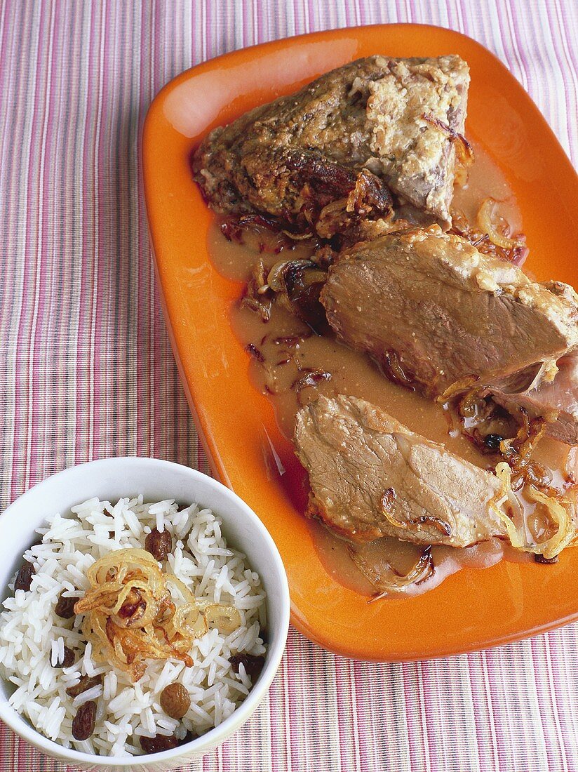 Leg of lamb with almond crust and Bengali rice pulao, India